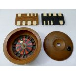 A Victorian treen turned fruit wood miniature roulette game, 10.