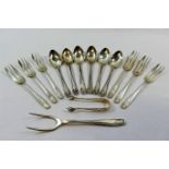 A set of six Edwardian silver handled fruit knives and forks, Sheffield 1906,