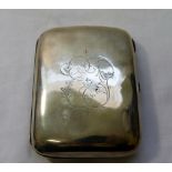 An Edwardian silver cigar case, Chester 1903, with engraved intertwined initials, 12cm x 9cm, 4.