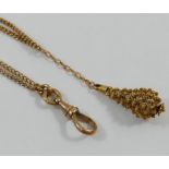 A 9 carat rose gold guard chain, with yellow metal filigree pendant attached,