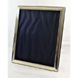 A large rectangular silver photograph frame, Sheffield 1997, by Richard Carr,