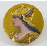 A 19th century French circular gold and enamel brooch depicting Joan of Arc, 2.