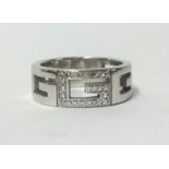 An 18ct Gucci designer ring set with diamonds with box and outer box, approx 9.20gms, finger size