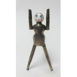 A pair of Edwardian silver and enamelled novelty sugar nips in the form of a peg doll with enamelled