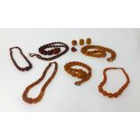 A collection of amber and amber style bead necklaces, overall weight 296gms.