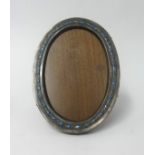 Liberty and Co, an enamelled silver opal photo frame, height 17cm with wood easel back (loose).