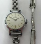 Tissot, a ladies wristwatch with booklet, box and purchase receipt dated 1969.