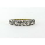 An 18ct five stone diamond ring, finger size R.