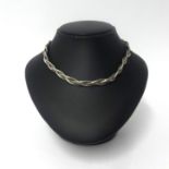 An Italian contemporary silver necklace, three strand of textured design, approx 44.7gms.