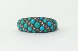 An Edwardian eleven row turquoise and diamond ring, finger size N.