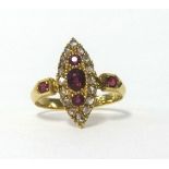 An 18ct antique ruby and diamond marquise set ring, finger size L.