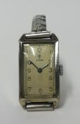 Tudor, a vintage tank cased wristwatch, back plate No.56261, manual wind, in working order.