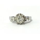 A diamond three stone ring, set with old cut diamonds, approx 1.00ct, finger size N.