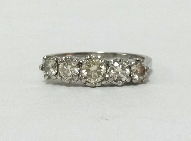 An antique five stone diamond ring, finger size R.