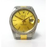 Rolex, a gents stainless steel and gold calendar wristwatch, with diamond bezel, Oyster Perpetual