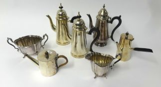 A quantity of assorted silver plated wares including coffee pots, chocolate pots, tea set etc.