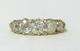 A fine 18ct diamond five stone ring, finger size U.