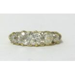 A fine 18ct diamond five stone ring, finger size U.