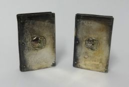 William Hutton, two Common Prayer books with silver hallmarked covers decorated with an art