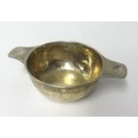 Liberty and Co, a Geo V silver quaich, the base stamped 'R.K.B, 1918', hallmarked 'L & Co',