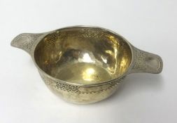 Liberty and Co, a Geo V silver quaich, the base stamped 'R.K.B, 1918', hallmarked 'L & Co',
