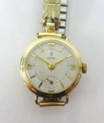 Tudor, a ladies gold cased traditional wristwatch with sub-second dial.