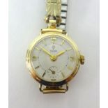 Tudor, a ladies gold cased traditional wristwatch with sub-second dial.