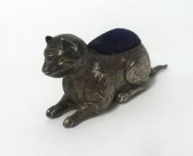 An Egyptian silver cat pin cushion, length approx 8.50cm, makers mark 'A & L Ltd, (Adie &