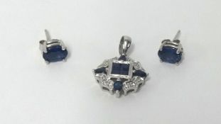 A pair of sapphire earrings and a sapphire and diamond pendant (2).