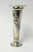 A silver trumpet vase, maker, 'S.M & Co' with embossed decoration of flowers, height 20cm, approx