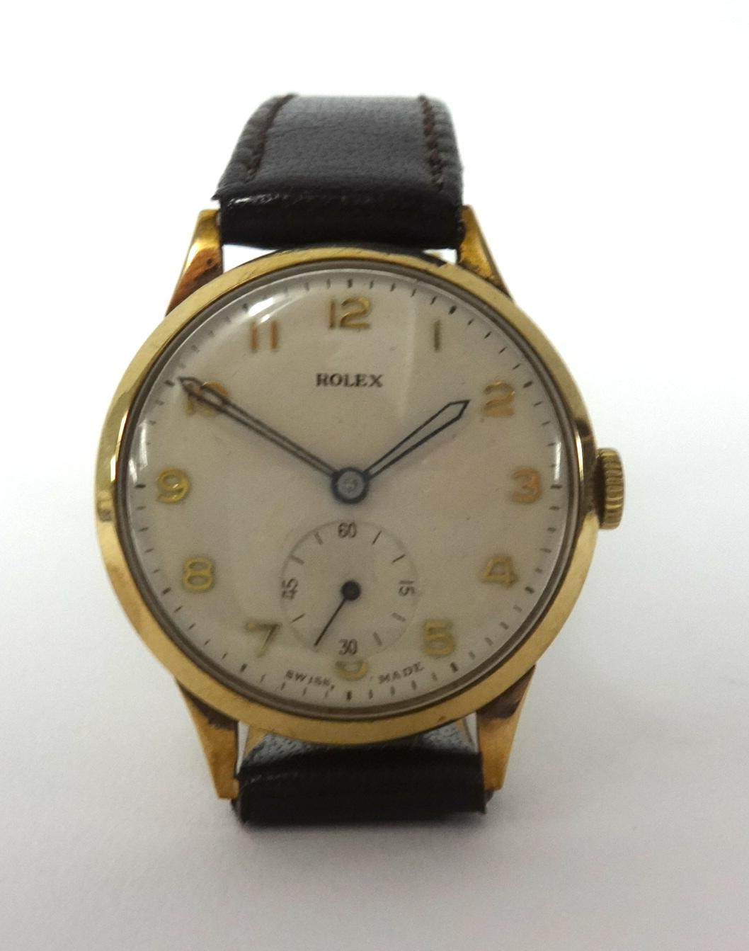 Rolex, a vintage gents 9ct gold cased wristwatch, the dial with arabic numerals and sub-second