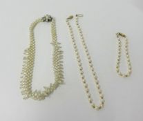 A pearl necklace and matching bracelet with a 9ct gold clasp and another (3).