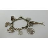 A silver charm bracelet, approx 65gms.