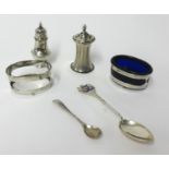 A Victorian silver condiments, two silver table salts (one lacking glass liner), two silver peppers,