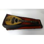 An Italian mandolin with paper label inside 'Giuseppe Vinaccia, Fu Gaetano. Napoi Anno 1895, in
