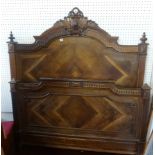 French carved walnut double bed.