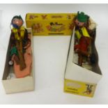 Two Pelham puppets, 'The Dutch Girl' and 'Boy', boxed.