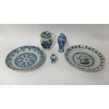 Two antique blue and white tin glaze wall plates, a early 19th century porcelain blue and white