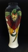 Moorcroft, a modern baluster shaped vase, 'Anna Lily', No.121/10, circa 1998, height 27cm, boxed.