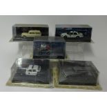 A collection of 007 model cars approx 52, also with a large collection of 007 magazines, approx