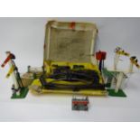 Hornby, Gauge 0 clockwork train set and various tin plate accessories including level crossing,