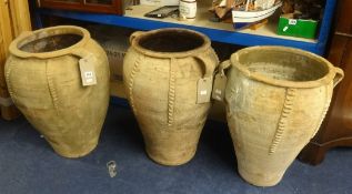 Three large Amphora style garden pots (3).