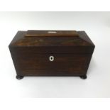 A 19th Century rosewood tea caddy, containing a note dated 1902 from an 'Elisabeth Glober'