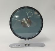 Of Jaeger Lecoultre style, a deco design table clock with chrome base, height 25cm.
