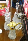 Five decanters including two claret jugs (5).