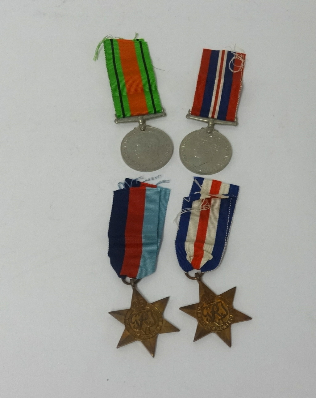 A set of four WW II medals awarded to 2737430 Lieutenant Corporal H.L.Green, comprising 39/45