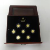 London Mint, The Millionaires Gold Edition of Seven replica gold coins, with album of