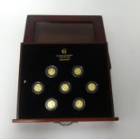 London Mint, The Millionaires Gold Edition of Seven replica gold coins, with album of