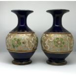 Doulton, a pair of slater style vases, impressed marks, height 15cm.
