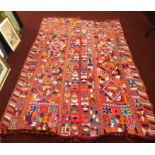 A large African rug, 150cm x 245cm..